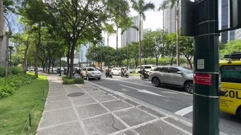 Cinematic View of a School Bus on a Street in BGC 4k 60fps Video stock 339206830