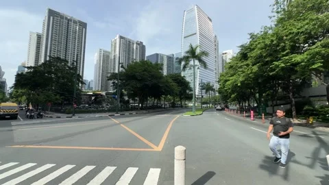 Cinematic View of a Street Intersection in BGC 4k 60fps Stock-Footage 339206660