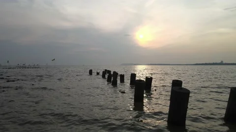Cinematic view on sunset and stone on the beach in Pasir Panjang Stock Footage 150722108