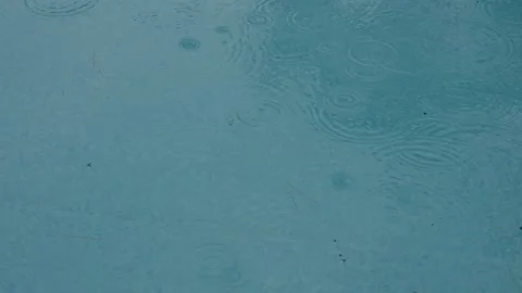 Cinematic view of swimming pool steps on a rainy day Stock Footage 338257563