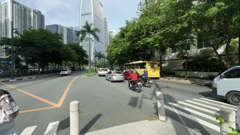 Cinematic View of Traffic in a Modern BGC Street 4k 60fps Vídeos de archivo 339206657