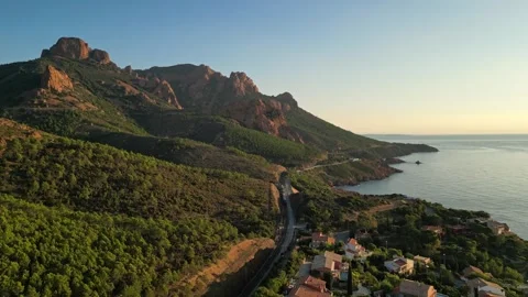 Cinematic view of a train crossing the Antheor Viaduct in the Esterel Mountains Stock Footage 320003553
