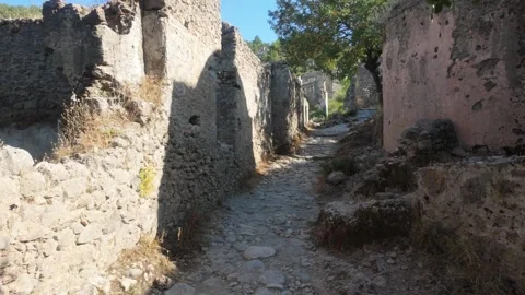 Cinematic Walking Path Through Abandoned Ruins in Ghost Town Stock Footage 338203230