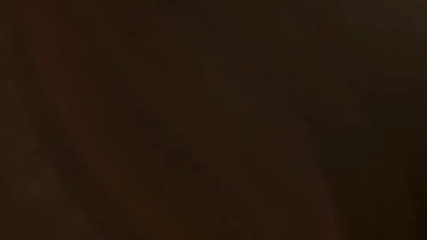 Cinematic Warm Light Overlay on Dark Background Stock Footage 325824601