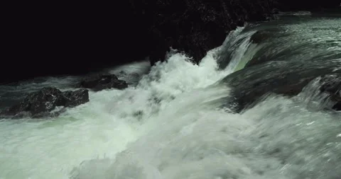 Cinematic Water Flow with Splash Over Rocks in Tropical Canyon 스톡 동영상 332606845