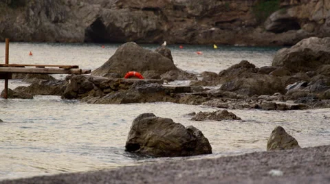 Cinematic Water Rocks Amalfi Coast Italy 4K Stock Video Footage Stockbeeldmateriaal 59083176