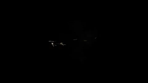Cinematic Weapon Fire Muzzle Flash Overlay Against Black Screen Stock Footage 336830862