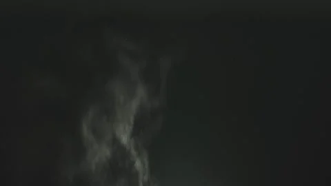 Cinematic white dust particles floating in air on black background. Stock Footage 337524711