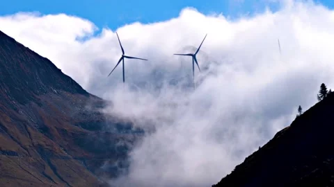 Cinematic Zoom In of Wind Turbines in Dramatic Misty Clouds, HD Stock Footage 212452868