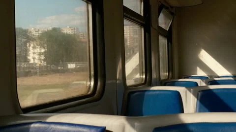 Cinematic,empty train carriage. blue seats, sunny daylight Stock Footage 280132994