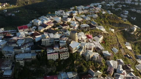 Cinematics panoramic drone view of ancient tower of mountain city of Derbent. Stock Footage 143778260