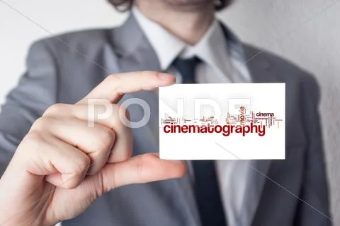 Cinematography. businessman in suit with a black tie showing or holding busin Stock Illustration