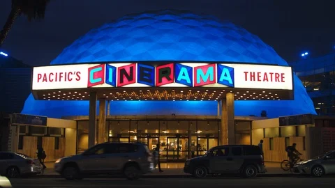 Cinerama Theater on Sunset Blvd at Night with Cars Driving Past Video stock 87637853