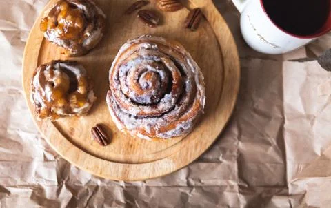 Cinnabon with coffee Stock Photos