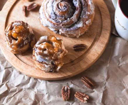 Cinnabon with coffee Stock Photos