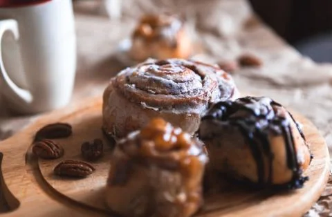 Cinnabon with coffee Stock Photos