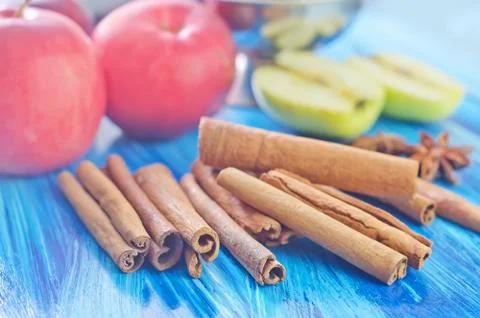 Cinnamon and apples Stock Photos