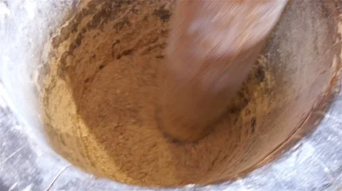 Cinnamon being pound in the pounder Stock Footage 57366133
