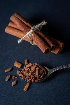 Cinnamon on a black background.  Stock Photos