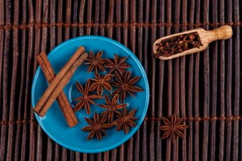 Cinnamon on blue Stock Photos