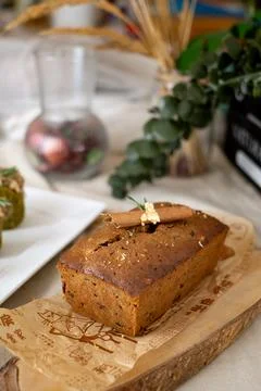 Cinnamon bread loaf set on cafe table. Stock-Fotos
