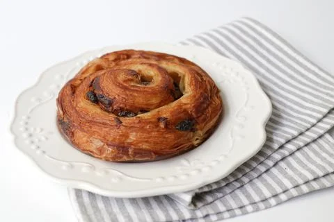 Cinnamon Bun on white background Stock Photos