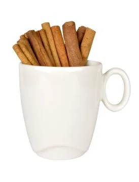 Cinnamon in a cup Stock Photos