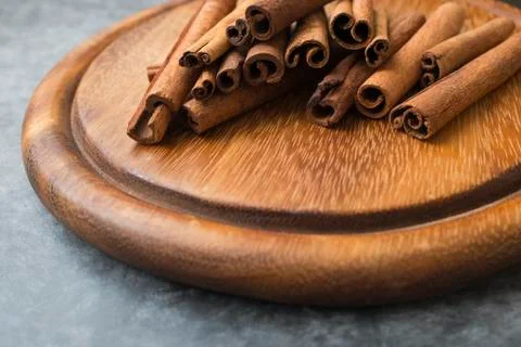 Cinnamon on desk Stock Photos