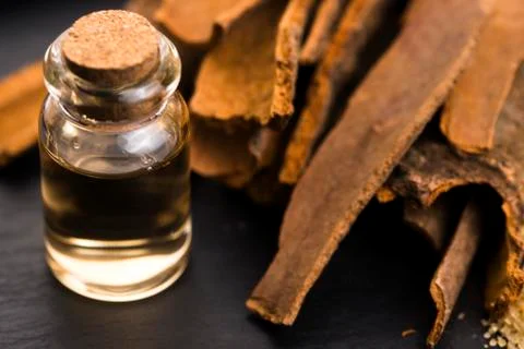 Cinnamon essential oil Stock Photos