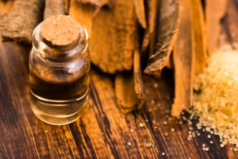 Cinnamon essential oil Stock Photos