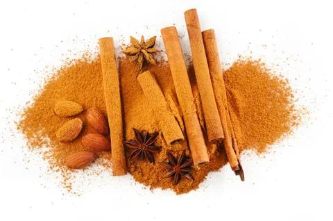 Cinnamon pile on white background Stock Photos