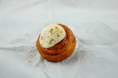 Cinnamon Roll isolated on grey background side view of french breakfast bak.. Stock Photos
