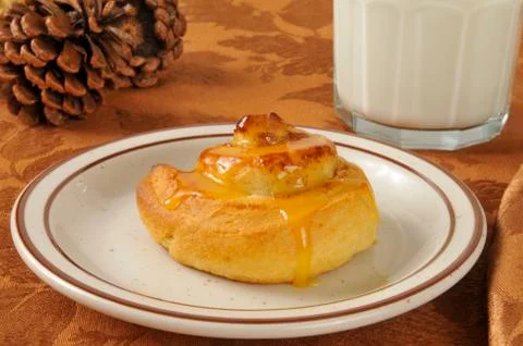 Cinnamon roll with milk Stock Photos
