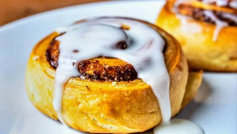 Cinnamon Roll Pastry with Sugar Glaze for Premium Baked Goods Food Object a.. Stock Photos