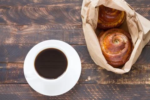Cinnamon rolls with coffee. Stock Photos