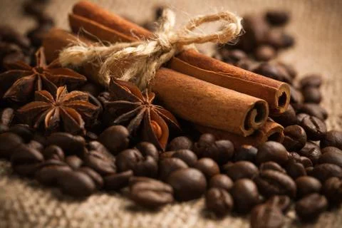 Cinnamon rolls with roasted coffee beans. macro Stock Photos