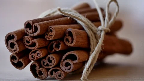 Cinnamon sticks background rope. 4k Close up shot, Slider equipment used. RL pan Stock Footage