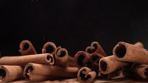 Cinnamon Sticks Falling in slow motion Stock Footage 118579552