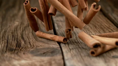 Cinnamon sticks falling in slow motion.  Shot with Phantom Flex 4K camera. Stock Footage 162944302