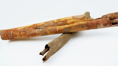 Cinnamon Sticks Rotating on White Background Isolated Stock Footage 325348807