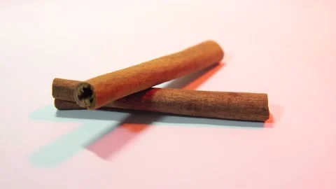 Cinnamon sticks of spin around themselves 360 on white background Stock Footage 149786830