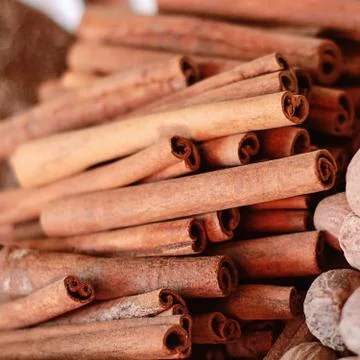 Cinnamon sticks on table Stock Photos
