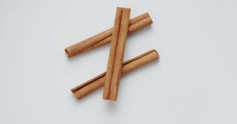 Cinnamon sticks on a white background Stock Footage 146481871