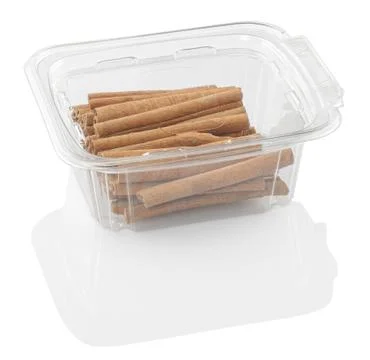 Cinnamon in a transparent plastic container Stock Photos