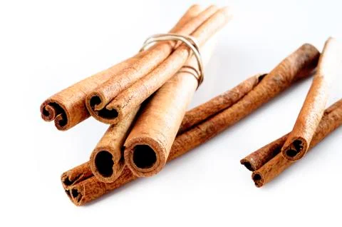 Cinnamon on white background Stock Photos
