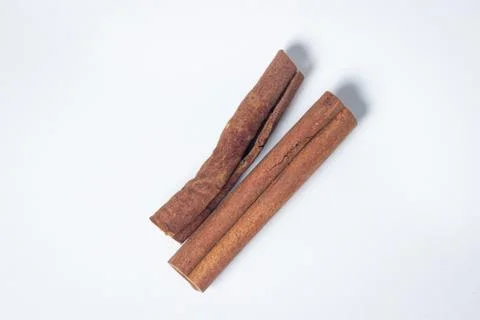 Cinnamon on a white background.  Stock Photos