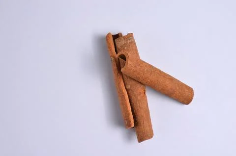 Cinnamon on a white background. Stock Photos