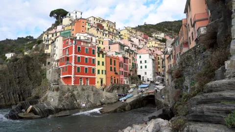 Cinque Terre Italy famous cliff town Riomaggiore colourful red yellow orang.. Stock Footage 242564751