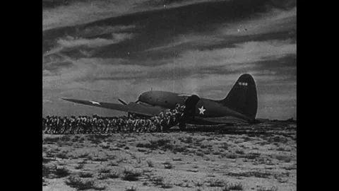 CIRCA - 1943: Shows the jeep being lifted by crane/sling for air or ship Stock Footage 339215938