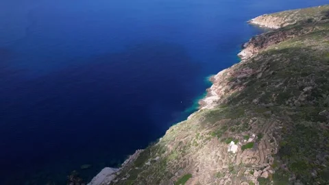 Circle Aerial drone view Capel Rosso sea coast Giglio Island Italy Stock Footage 244945447